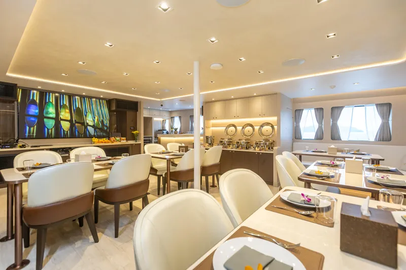 Vanora Yacht Photos Pics Luxurious dining area on 2023 Seacrest Marine 52m Yacht, featuring elegant decor and modern amenities.