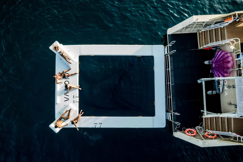 Vanora Yacht Photos Pics Aerial view of Seacrest Marine 52m Yacht, 2023, with people relaxing on deck.