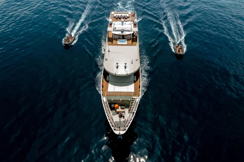 Vanora Yacht Photos Pics Aerial view of 2023 Seacrest Marine 52m Yacht with two escort boats.