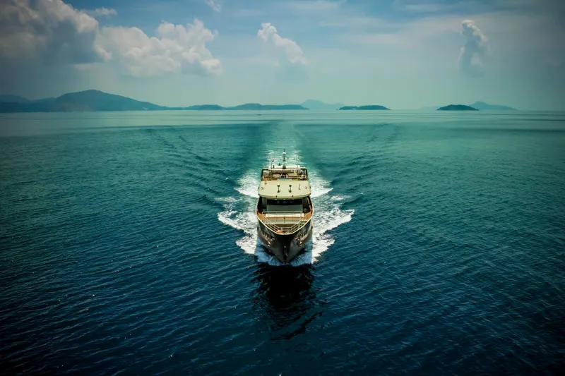 Vanora Yacht Photos Pics Luxurious 2023 Seacrest Marine 52m Yacht cruising on serene blue waters.