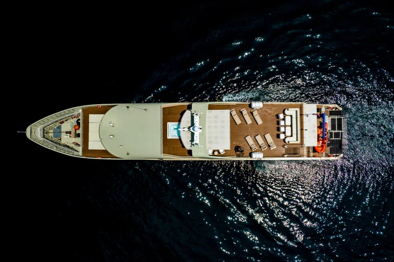 Vanora Yacht Photos Pics Aerial view of 2023 Seacrest Marine 52m yacht on dark water.
