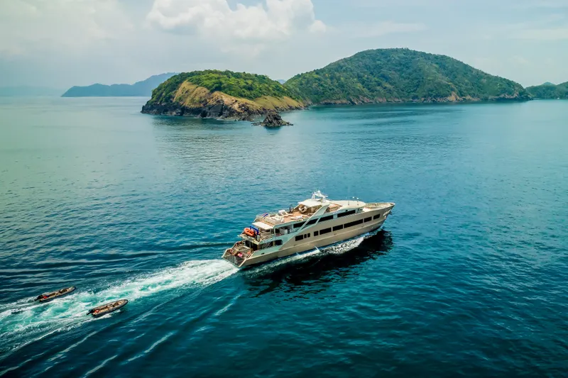 Vanora Yacht Photos Pics Luxurious 2023 Seacrest Marine 52m yacht cruising near scenic islands.