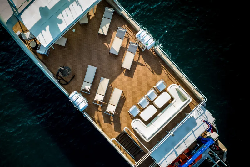 Vanora Yacht Photos Pics Aerial view of 2023 Seacrest Marine 52m yacht deck with lounge chairs and seating.