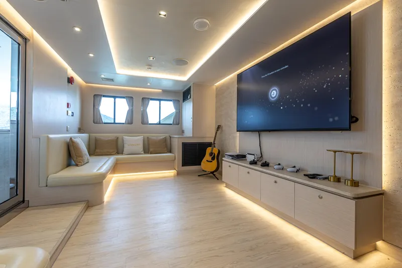 Vanora Yacht Photos Pics Luxurious interior of 2023 Seacrest Marine 52m Yacht with modern entertainment setup.