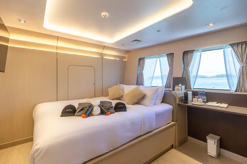 Vanora Yacht Photos Pics Luxurious bedroom interior of 2023 Seacrest Marine 52m Yacht with ocean view.