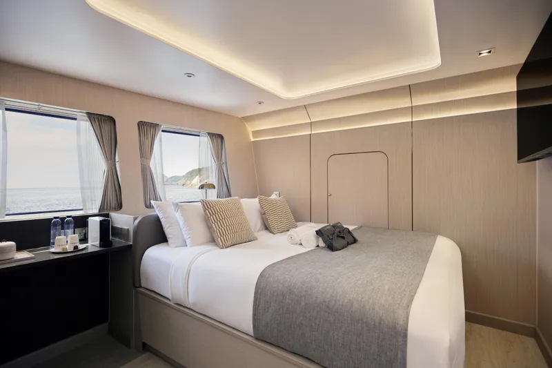 Vanora Yacht Photos Pics Luxurious bedroom interior of 2023 Seacrest Marine 52m Yacht with ocean view.