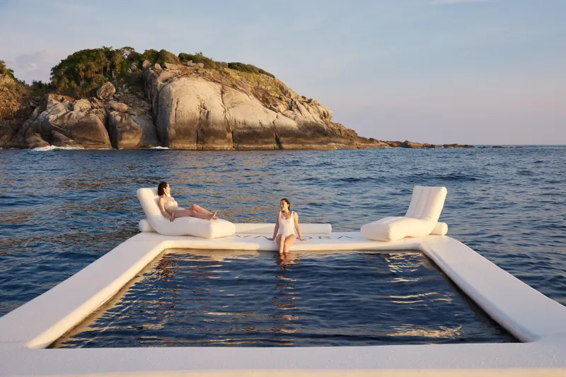 Vanora Yacht Photos Pics Luxurious Seacrest Marine 52m Yacht, 2023, with floating lounge, scenic ocean view.