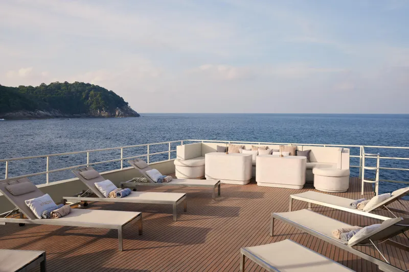 Vanora Yacht Photos Pics Luxurious deck of 2023 Seacrest Marine 52m Yacht with sun loungers and ocean view.