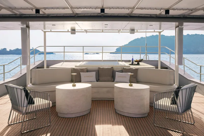 Vanora Yacht Photos Pics Luxurious 2023 Seacrest Marine 52m Yacht deck with elegant seating and ocean view.