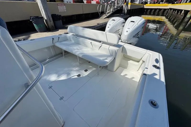  Yacht Photos Pics 2014 SeaVee 340B Open boat with dual engines, docked at a marina.