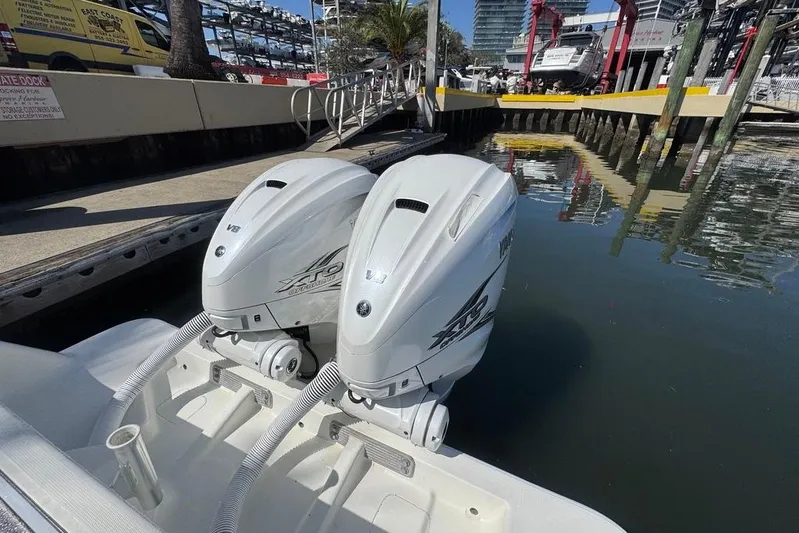  Yacht Photos Pics 2014 SeaVee 340B Open with twin Yamaha outboard engines docked at marina.