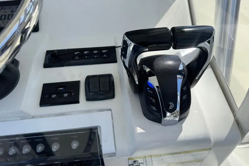  Yacht Photos Pics 2014 SeaVee 340B Open boat controls and dashboard with throttle and switches.
