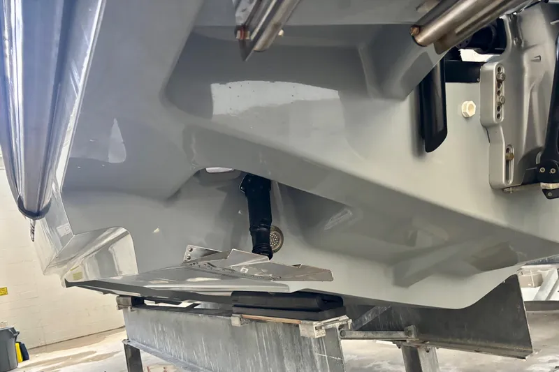  Yacht Photos Pics 2024 Axopar 37 XC Cross Cabin hull detail in a workshop setting.