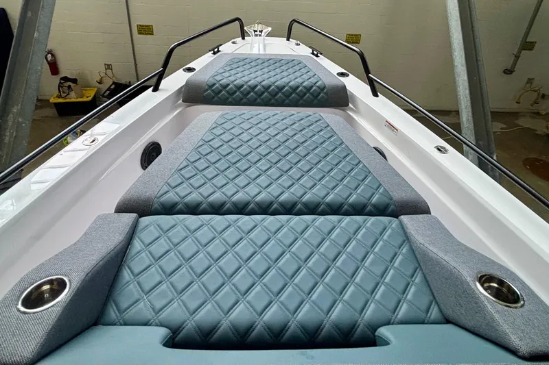  Yacht Photos Pics Luxurious seating on 2024 Axopar 37 XC Cross Cabin with diamond-pattern upholstery.