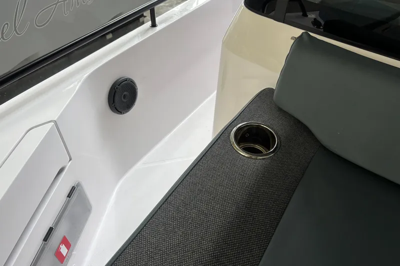  Yacht Photos Pics 2024 Axopar 37 XC Cross Cabin interior with speaker and cup holder detail.