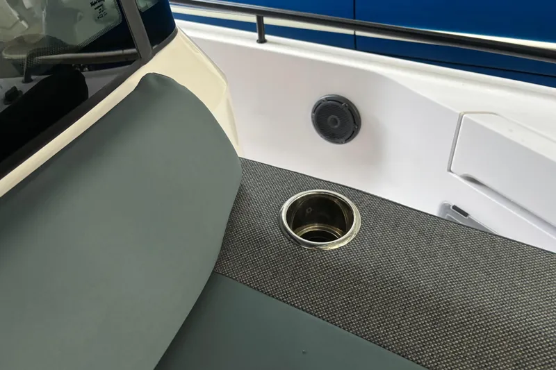  Yacht Photos Pics 2024 Axopar 37 XC Cross Cabin interior with cup holder and speaker detail.