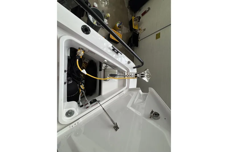  Yacht Photos Pics 2024 Axopar 37 XC Cross Cabin engine compartment with wiring and components.