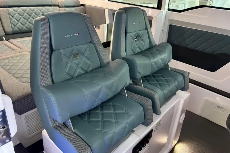  Yacht Photos Pics 2024 Axopar 37 XC Cross Cabin interior with luxurious quilted seating.