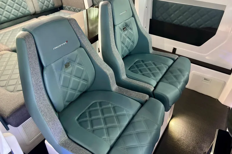  Yacht Photos Pics 2024 Axopar 37 XC Cross Cabin interior with luxurious quilted seats.