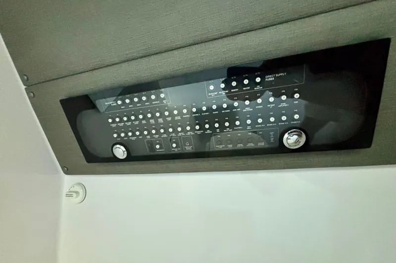  Yacht Photos Pics 2024 Axopar 37 XC Cross Cabin control panel with switches and knobs.
