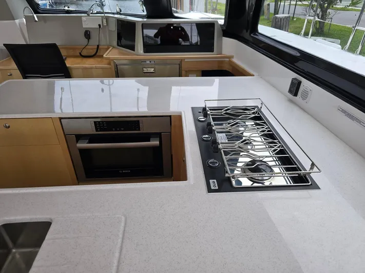  Yacht Photos Pics Modern kitchen in 2025 Seawind 1370 yacht with stove and oven.