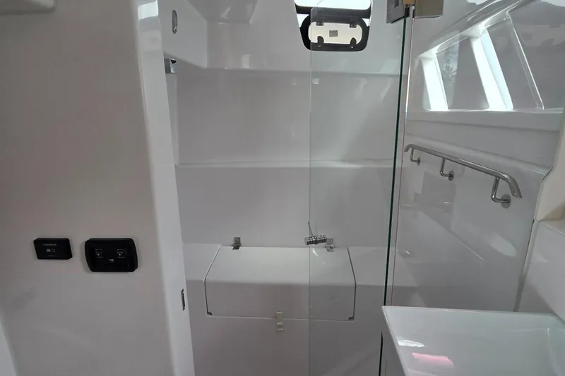 Yacht Photos Pics Interior of 2025 Seawind 1370 yacht, featuring modern bathroom design with glass shower.