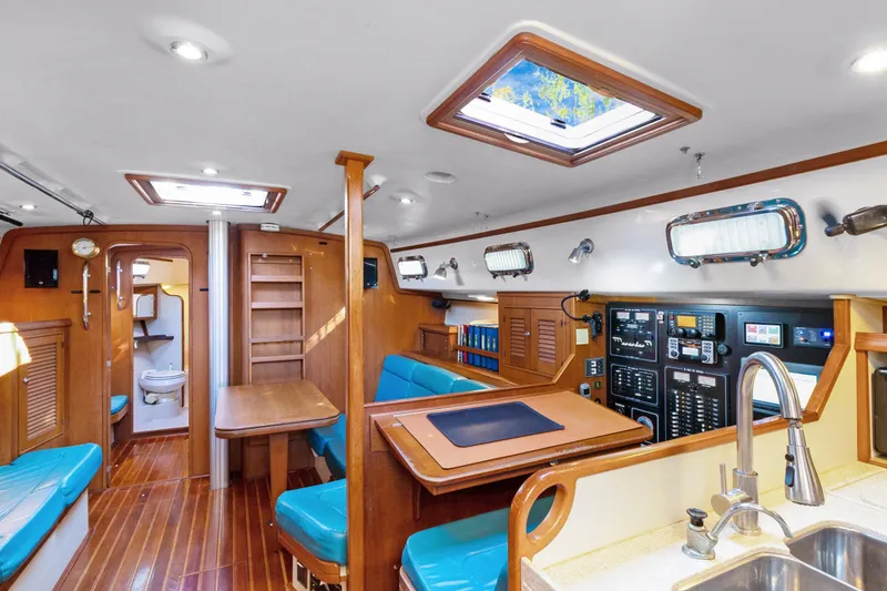Mawe Yacht Photos Pics Interior of 2006 Island Packet 440 yacht with wood finish and modern amenities.