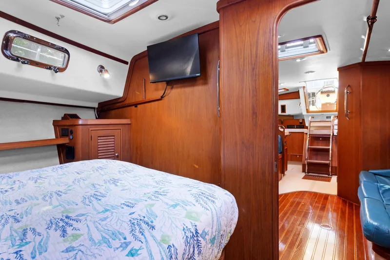 Mawe Yacht Photos Pics Interior of 2006 Island Packet 440 yacht with wood finish and cozy cabin.