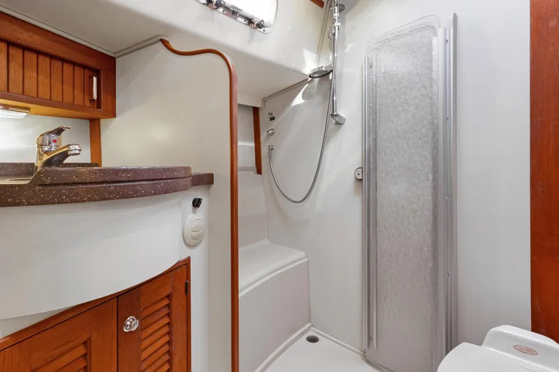 Mawe Yacht Photos Pics Bathroom interior of 2006 Island Packet 440 yacht with shower and sink.
