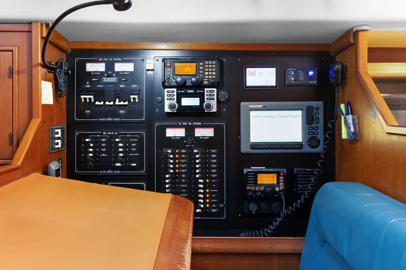 Mawe Yacht Photos Pics Electrical control panel on 2006 Island Packet 440 yacht, featuring navigation and communication equipment.