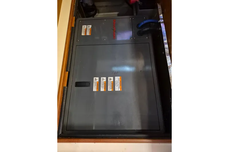 Mawe Yacht Photos Pics Electrical panel on 2006 Island Packet 440 sailboat, featuring safety warning labels.