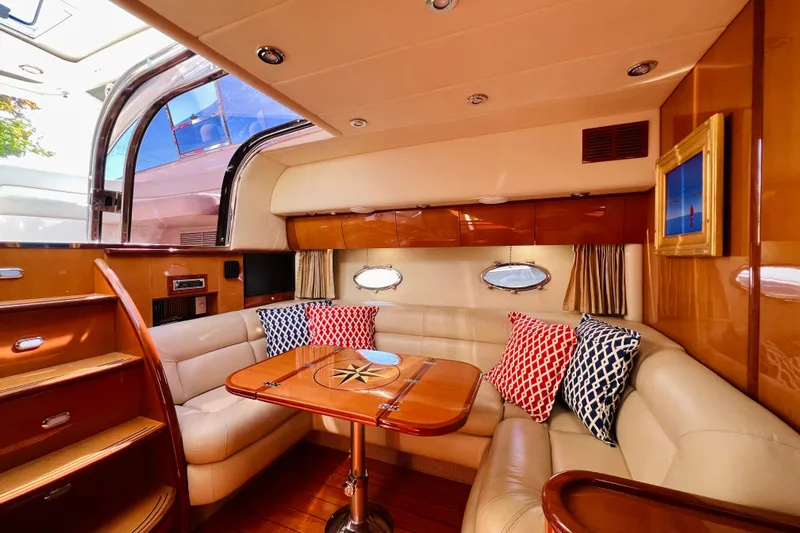  Yacht Photos Pics Luxurious interior of 2007 Windy Typhoon 43 yacht with plush seating and nautical decor.