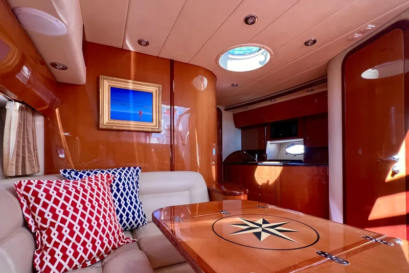  Yacht Photos Pics Luxurious 2007 Windy Typhoon 43 yacht interior with elegant wood finish and decorative pillows.