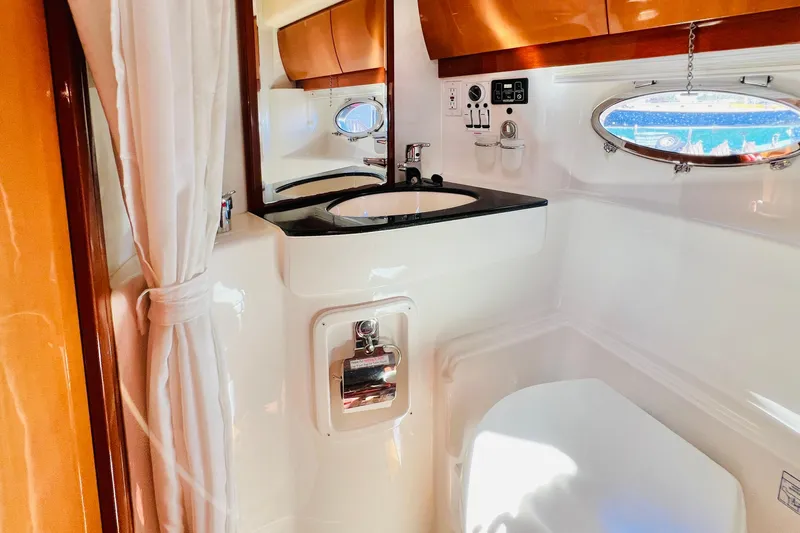  Yacht Photos Pics Luxurious bathroom interior of 2007 Windy Typhoon 43 yacht with modern fixtures.