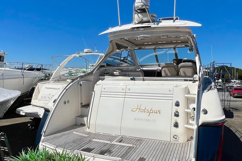  Yacht Photos Pics 2007 Windy Typhoon 43 yacht docked, featuring spacious deck and luxury seating.