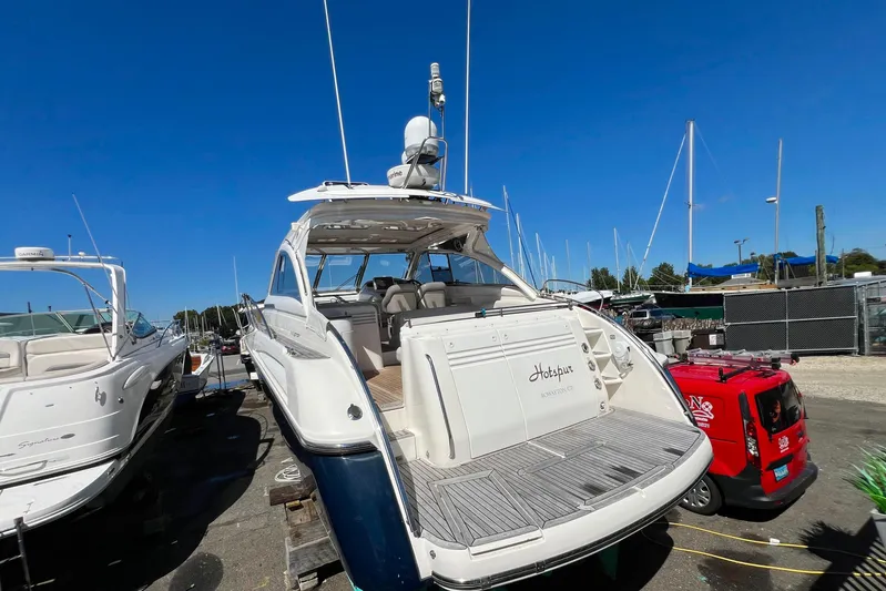  Yacht Photos Pics 2007 Windy Typhoon 43 yacht docked, showcasing sleek design and spacious deck.