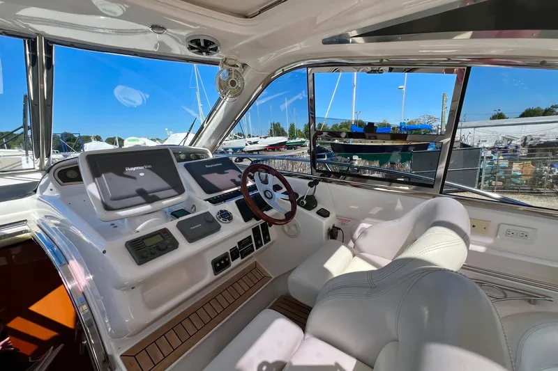  Yacht Photos Pics Luxurious helm of 2007 Windy Typhoon 43 yacht with advanced navigation systems.