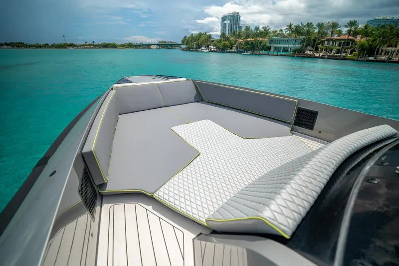 Mako Yacht Photos Pics Luxurious 2024 Maori 46ft yacht with sleek deck design on turquoise waters.