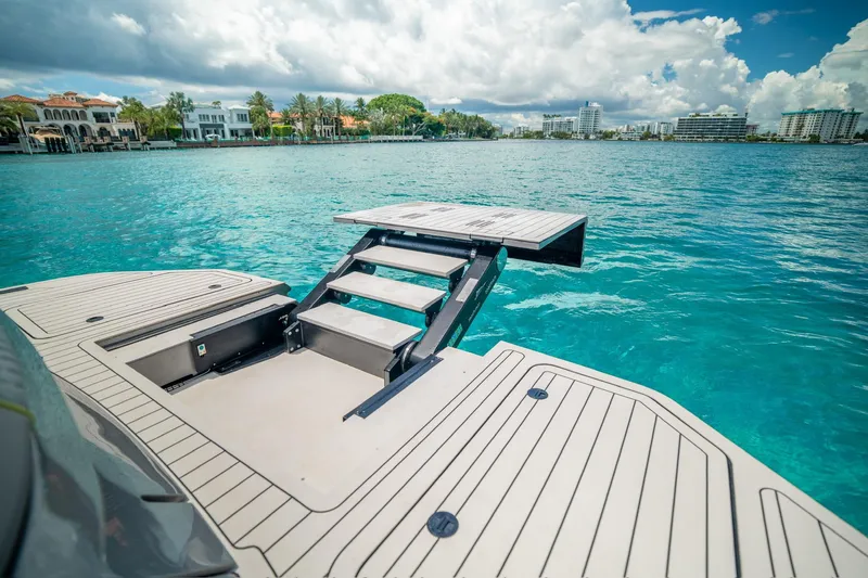 Mako Yacht Photos Pics Luxury Maori 46ft yacht with retractable swim platform, 2024 model, in turquoise waters.