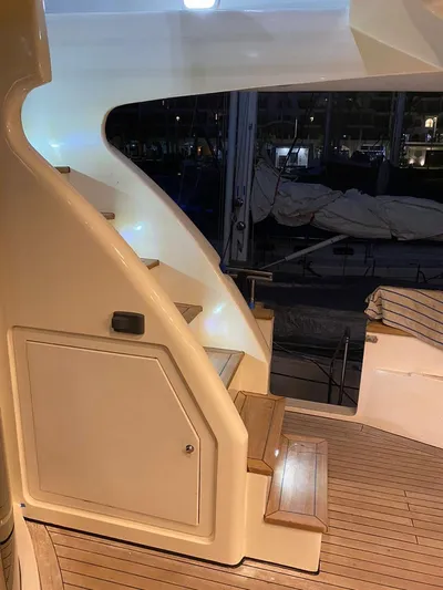  Yacht Photos Pics Staircase on 1998 Azimut 85 Ultimate yacht with wooden steps and sleek design.