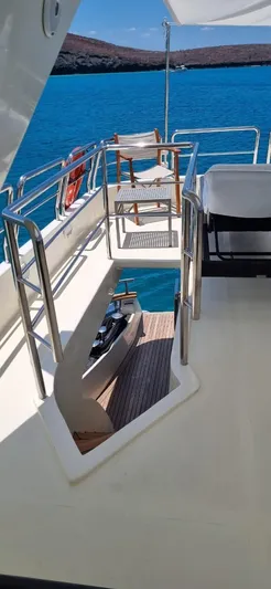  Yacht Photos Pics Azimut 85 Ultimate yacht deck, 1998 model, overlooking serene blue waters.