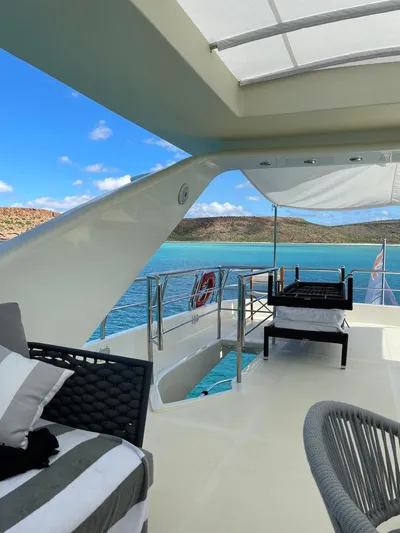  Yacht Photos Pics Luxurious 1998 Azimut 85 Ultimate yacht deck with ocean view and modern seating.