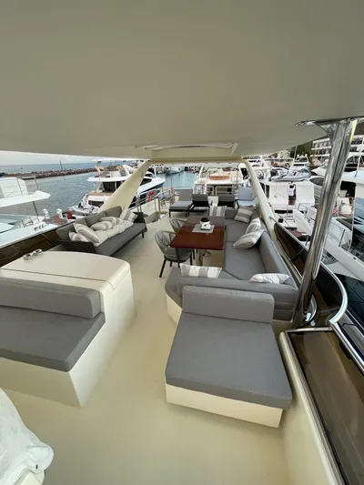  Yacht Photos Pics Luxurious 1998 Azimut 85 Ultimate yacht with spacious outdoor seating and elegant design.