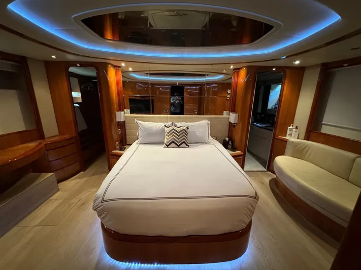 Yacht Photos Pics Luxurious bedroom interior of 1998 Azimut 85 Ultimate yacht with ambient lighting.