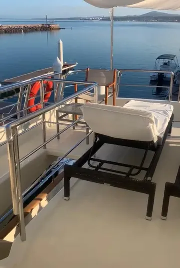  Yacht Photos Pics Luxury deck view on 1998 Azimut 85 Ultimate yacht, overlooking serene waters.