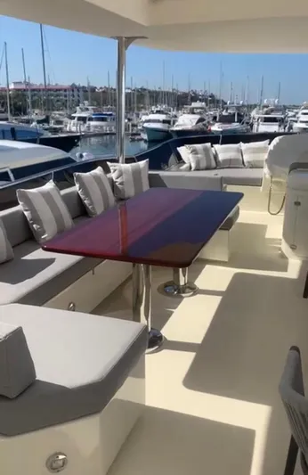  Yacht Photos Pics Luxury yacht Azimut 85 Ultimate 1998 with elegant outdoor seating and dining area.