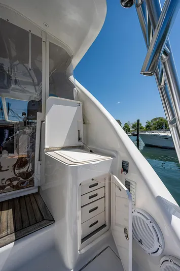 Wanted Yacht Photos Pics 2012 Cabo 44 HTX yacht interior with storage drawers and sleek design.