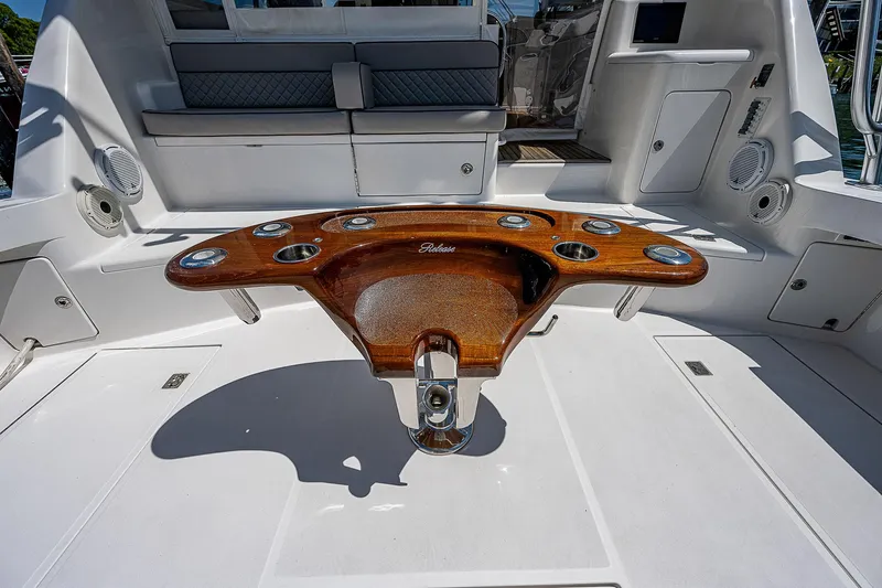 Wanted Yacht Photos Pics Luxury Cabo 44 HTX 2012 yacht cockpit with polished wooden fishing station.