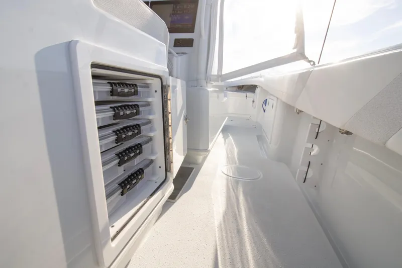  Yacht Photos Pics 2025 Yellowfin 32 Offshore boat interior with storage compartments and sleek design.
