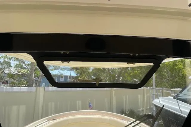  Yacht Photos Pics 2020 Chris-Craft Catalina 30 boat interior view with open hatch and outdoor scenery.